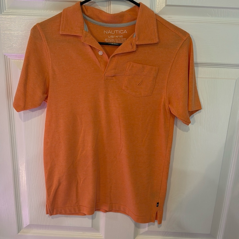 #51 Boys Nautica orange shirt with pocket.